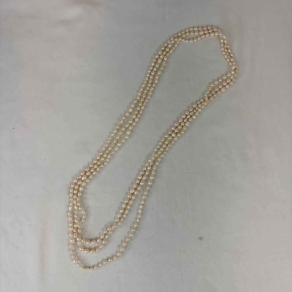 Long Infinity Fresh Water Pearl Strand Necklace Fashionable Durable Timeless